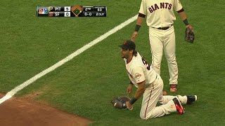 Morse battles the wind, makes a diving catch