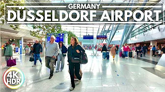 Düsseldorf International Airport DUS in Germany, October 2024 - Germans Escaping Cold Autumn 4K HDR
