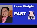 Fasting and Weight Loss - Solving the Two-Compartment problem