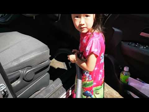 Adelicia + Alethea washing car 