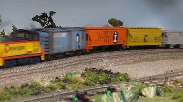 Chessie System R R covered hopper car local freight train.
