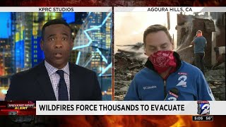 Wildfires force thousands to evacuate in Southern California