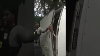 Bodycam shows officers rescuing girls from locked, 97-degree trailer