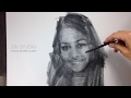 Drawing portrait in charcoal.