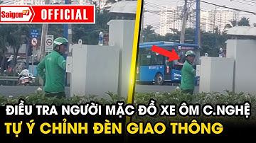 Điều tra người mặc đồ xe ôm công nghệ tự ý điều khiển tủ đèn giao thông ở TP.HCM | SaigonTV