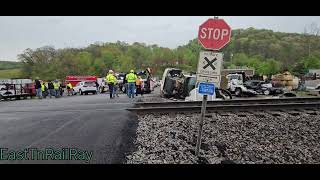 Norfolk Southern 13Z hits a  large vacuum truck, and it destroyed several other vehicles. MP 402.