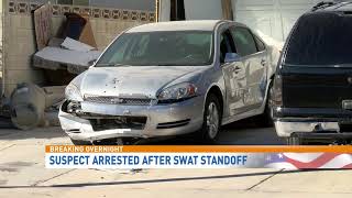 Man suspected of ramming home with Bobcat arrested after SWAT standoff