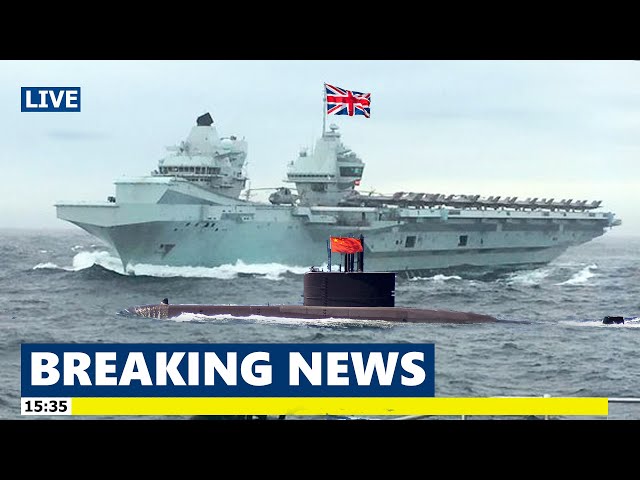 UK Aircraft Carrier warns Chinese Submarine that is hunting them in the South China Sea class=