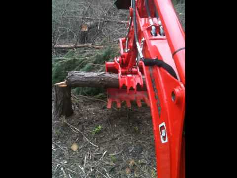 Backhoe with thumb