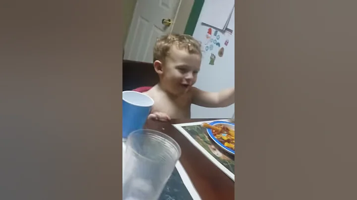 Lil brother sees his reflection in the window