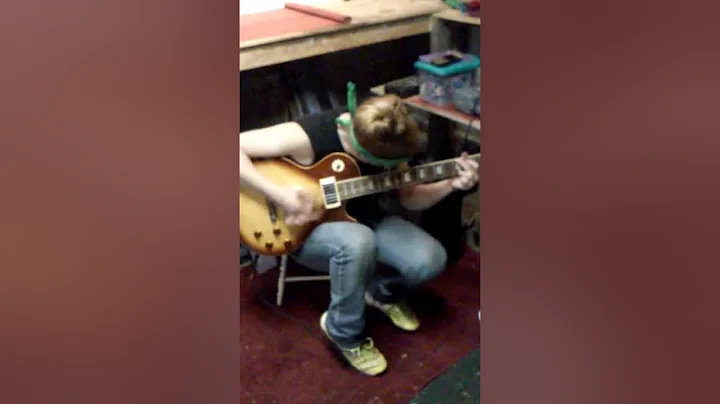 Abby Fowler playing guitar