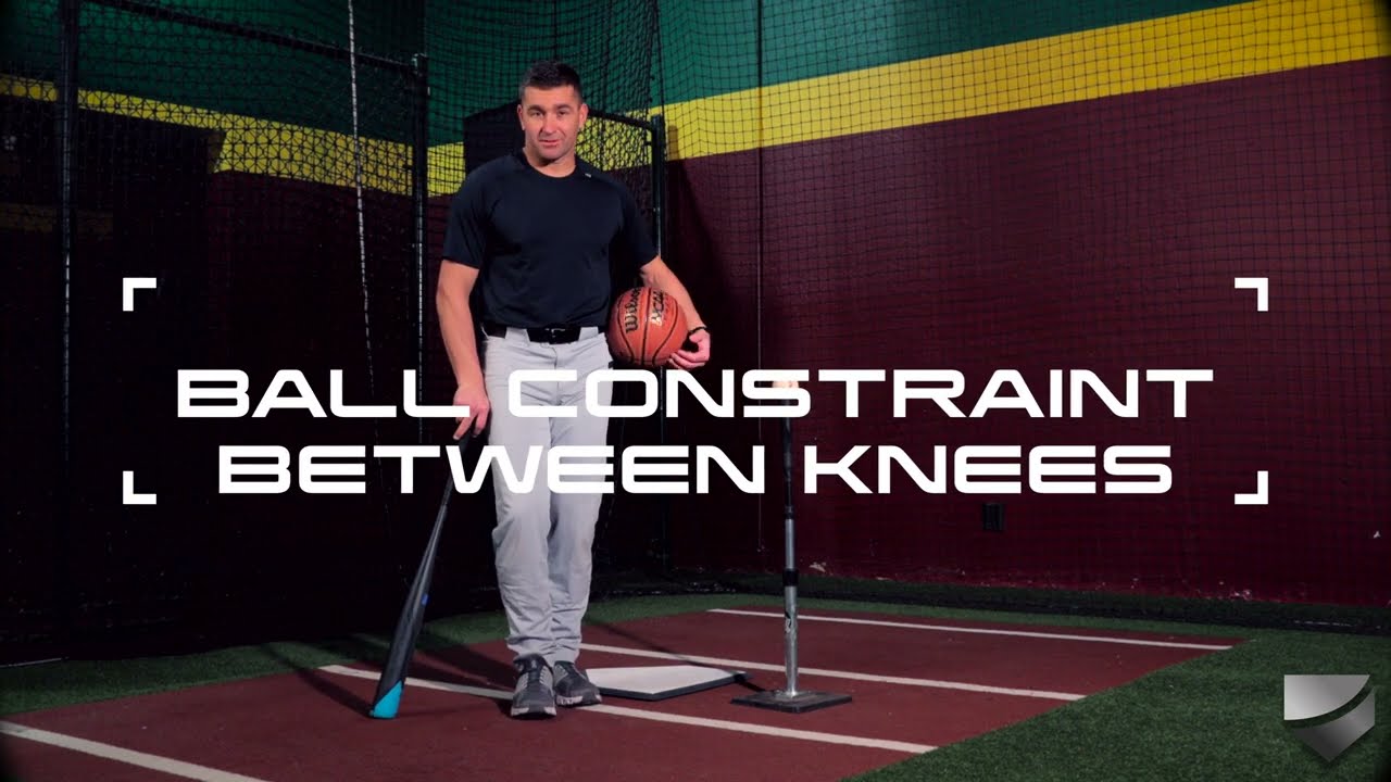 Ball Constraint Between Knees Hitting Drills with Coach Erik Bakich