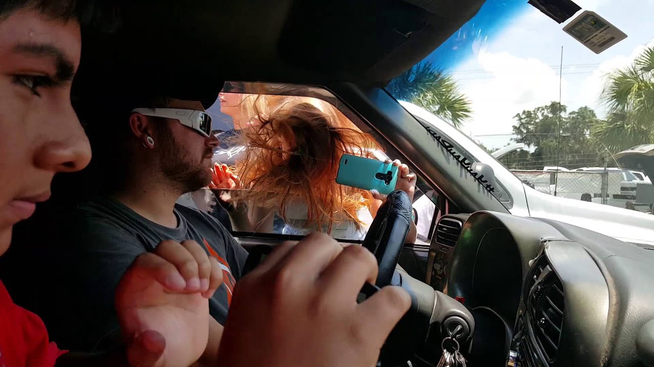 Girl Basshead getting Hair tricks at SPL Car Audio Competition in Florida