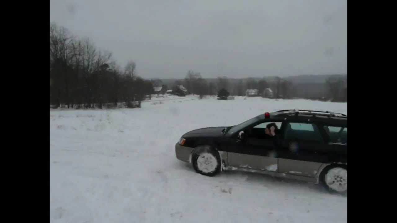 2000 Subaru Legacy Outback chasing a snowmobile in 12+ inches of snow ...