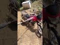 This motorcycle is so dirty, it's covered in mud!!