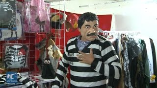Halloween mask and outfit of drug lord reflect grassroots humor of Mexicans