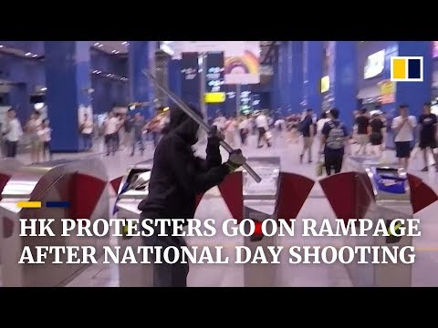Hong Kong protesters go on rampage after National Day shooting