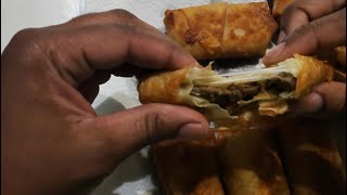 BREAK AH LEG SMOKE SHOP cooking Philly cheese steak egg rolls