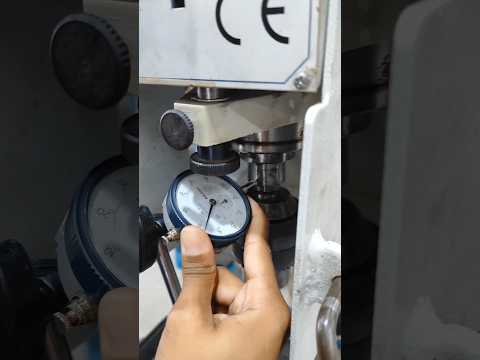 Verificação de concentricidade do eixo de uma fresadora
