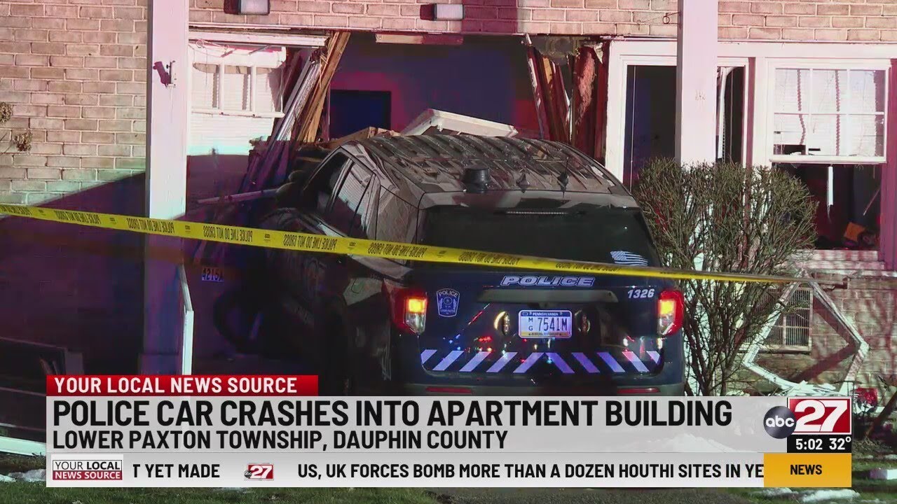 Police car crashes into apartment building - YouTube