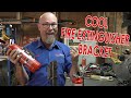 A COOL FIRE EXTINGUISHER BRACKET to replace the standard useless one!
