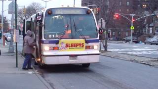 MTA NYCT Bus 2009 Orion VII NG B7 1996 Nova-RTS B82LTD Bus at Flatbush Ave