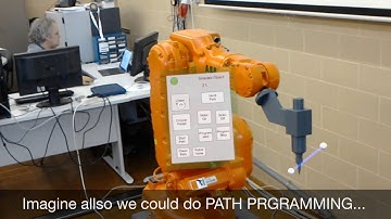 Application of Mixed Reality in Robot Manipulator Programming