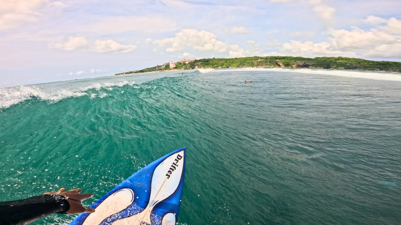 Elevator Thrills: Surfing the Left Break at Geger Beach on High Tide