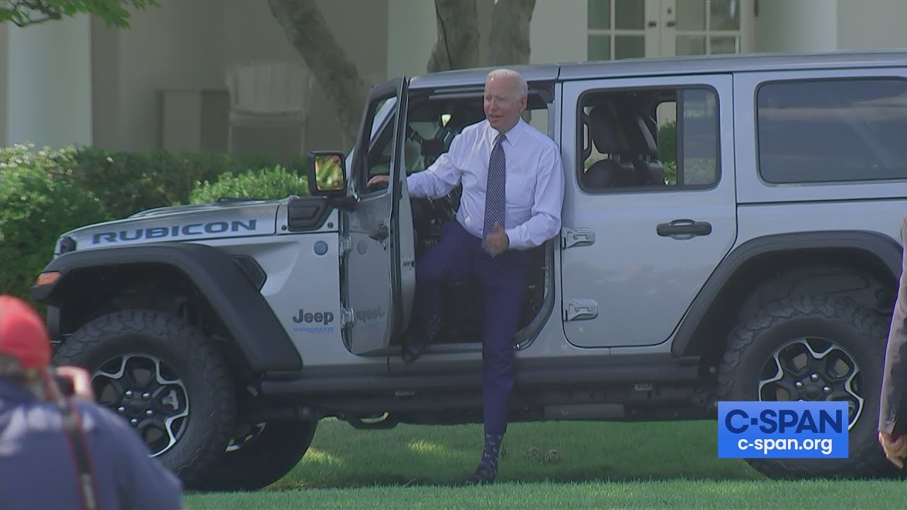 President Biden Drives an Electric Jeep Wrangler around White House South Lawn
