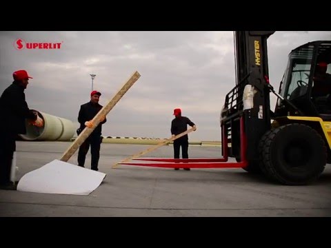 Denesting Heavy Weight GRP Pipes Of Different Diameters From Each Other With A Forklift