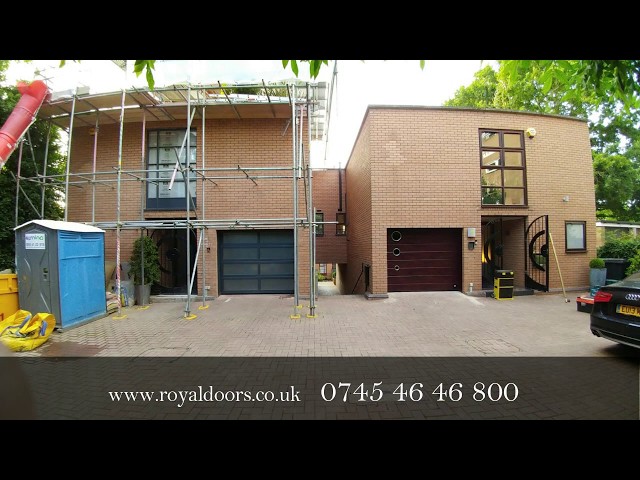 Electric Garage Door - Royal Rosewood Sectional Garage Door.