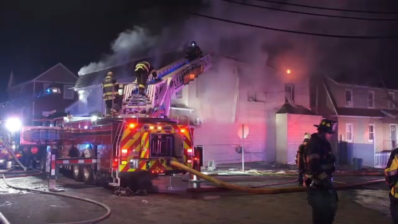 Firefighters battle 2-alarm fire at row house in East Orange, NJ - YouTube