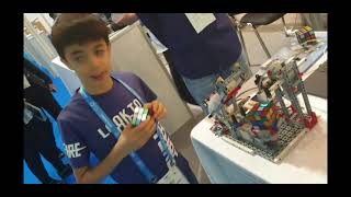 8 year old Adam El Rafey - Man vs Machine Rubik's Challenge!