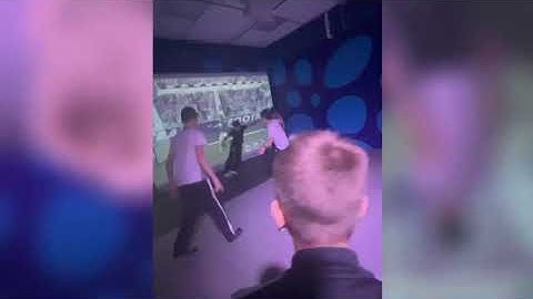 Interactive football in an entertainment center