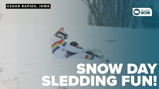 Kids take advantage of snow day off from school on the sledding hill
