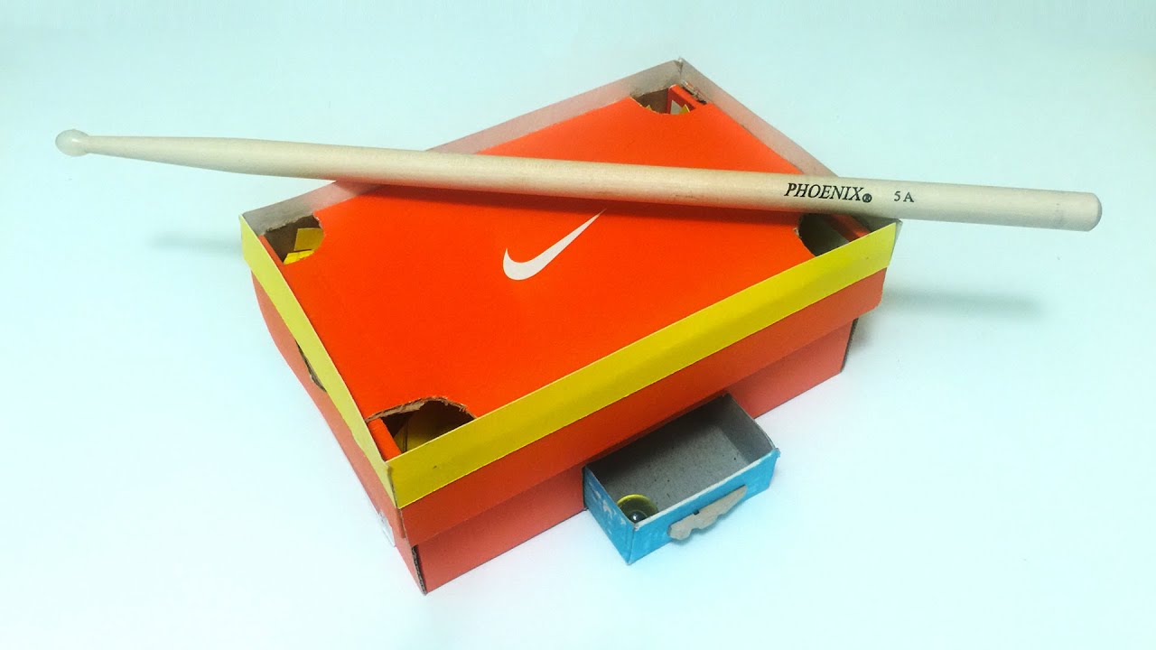 caixa de tenis da nike