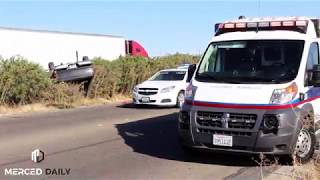 Driver survives after pickup overturns in Merced County