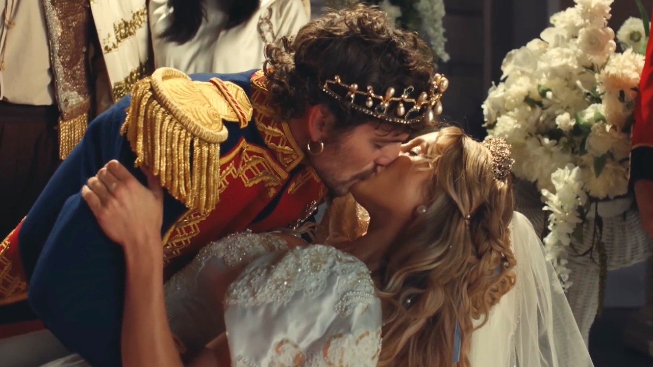 Benson Boone KISSES Alix Earle in Theatrical ‘Time of My Life’ Music Video