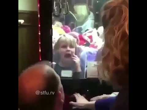 Kid gets stuck in claw machine