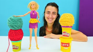 Barbie oyunları. Sevcan Barbie için play doh oyun hamuru ile elbise yapıyor