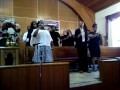 Lauretta lead singing gospel song with FCOG mass choir