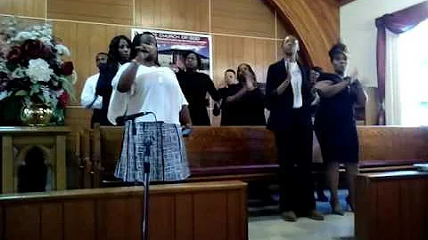 Lauretta lead singing gospel song with FCOG mass choir