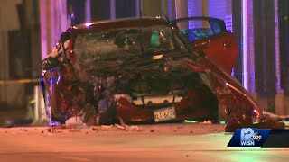 Man shot while driving, crashes into pole