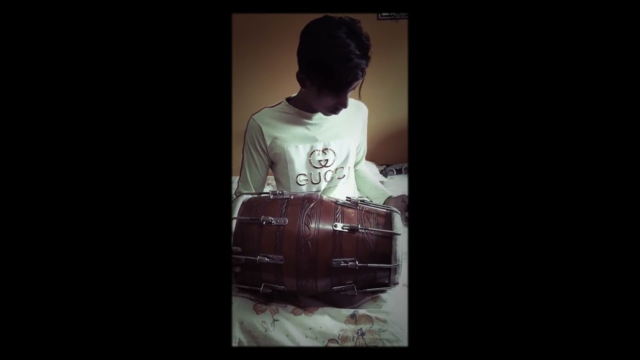 Is shaane Karam ka kya kehna (made by dholak performance)singer-: Nusrat Fateh Ali Khan.