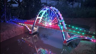 Construction of a cable-stayed arch bridge across the canal