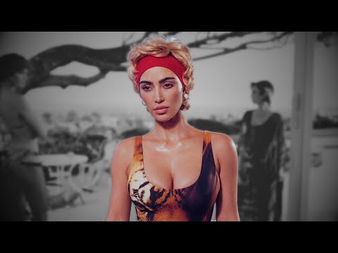 Kim Kardashian Unrecognizable in Blonde Curls & Tiger Swimsuit for Wild Cavalli Collab!