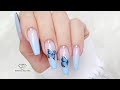 Baby blue nails with butterfly's 🦋🦋🦋. Faded French nails. Blue babyboomer nails