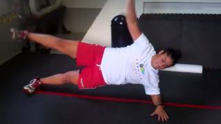 Burdenko Athlete Training - side plank jack with kettlebell