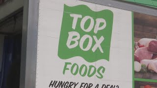 Top Box hosts grocery pop-up in Rockford for local families in need