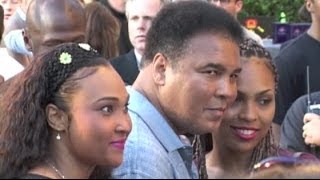 MUHAMMAD ALI steps out with daughters to attend movie premiere